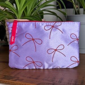 Ipsy Purple Makeup Bag with Red Bow Design